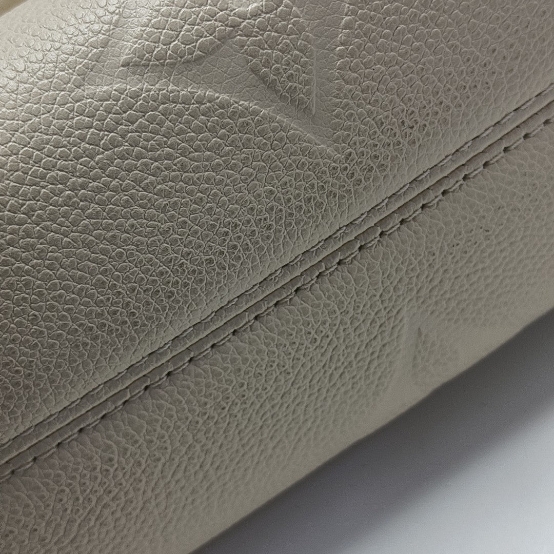 ONTHEGO EAST WEST PM Monogram Calfskin White