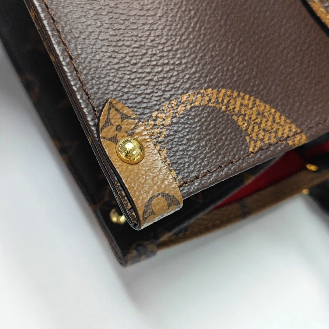 ONTHEGO MM Monogram Coated Canvas Brown