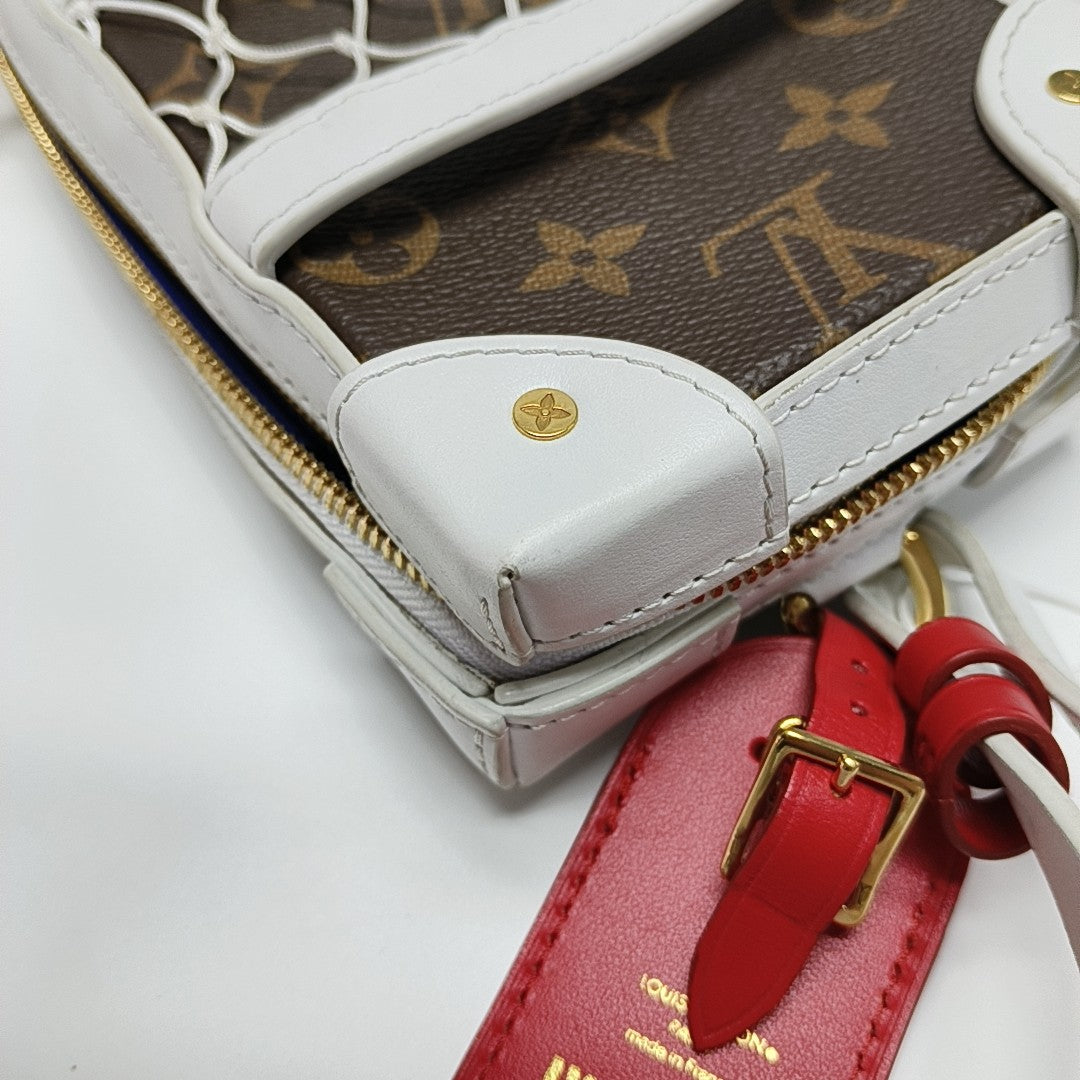 SOFT TRUNK Monogram Coated Canvas Brown