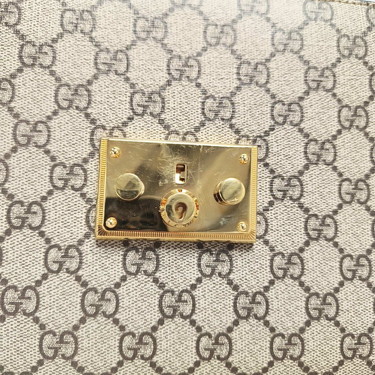 Padlock Small Monogram Coated Canvas Beige