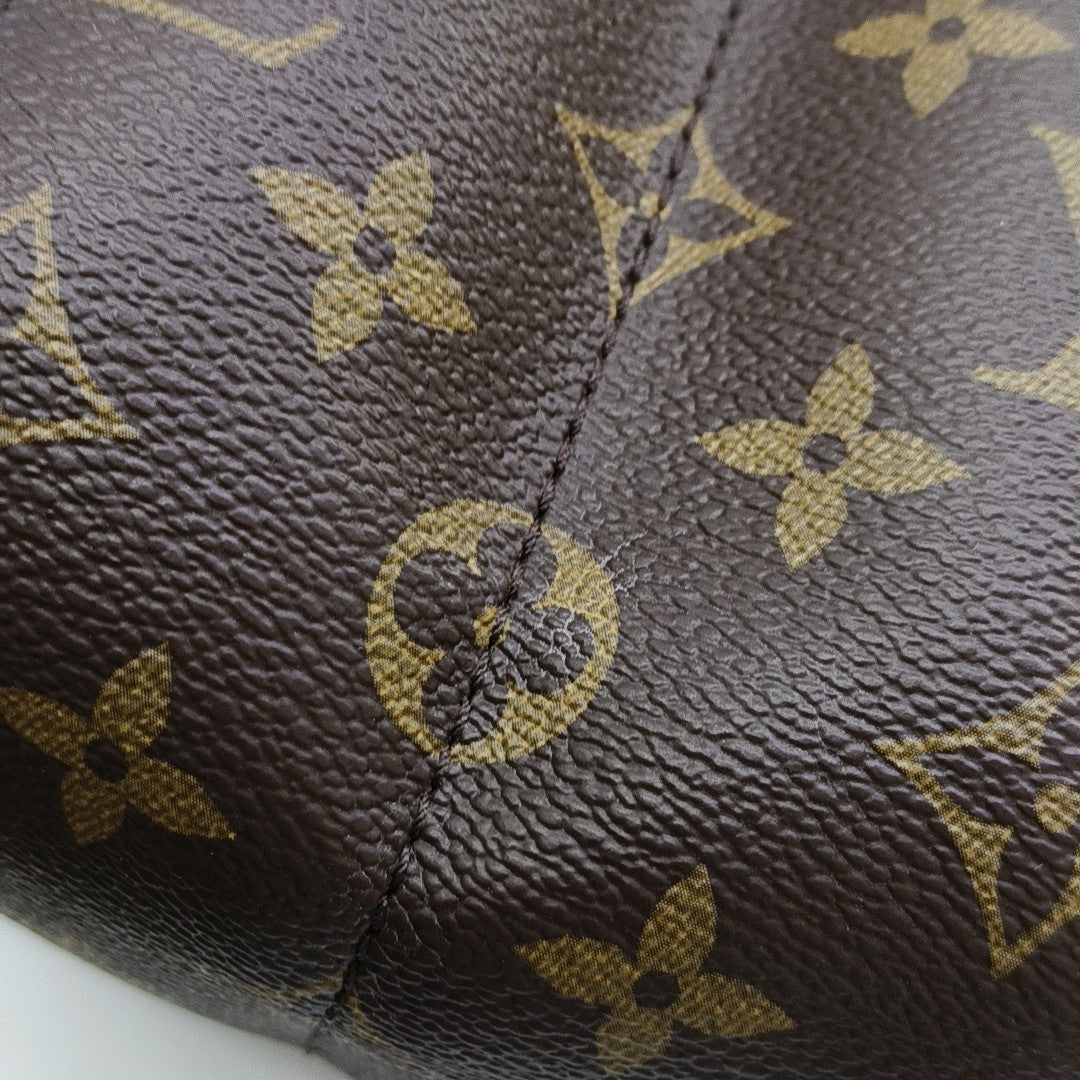 PALM SPRINGS Mini Monogram Coated Canvas Brown