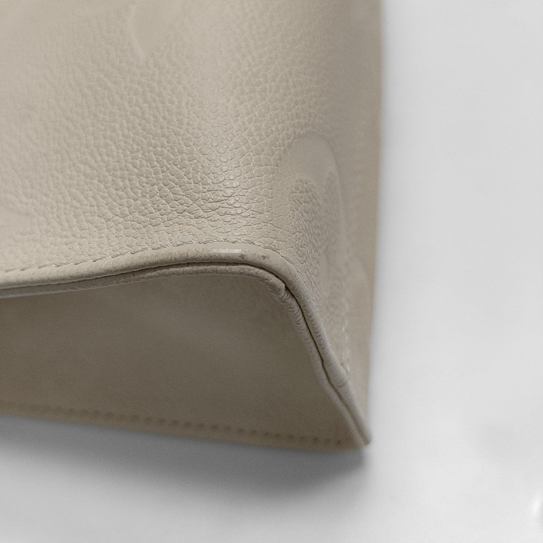 ONTHEGO PM Monogram Calfskin Beige