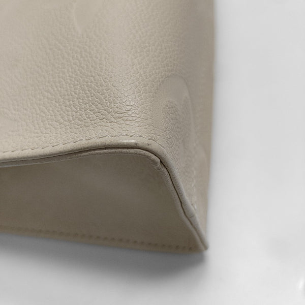 ONTHEGO PM Monogram Calfskin Beige