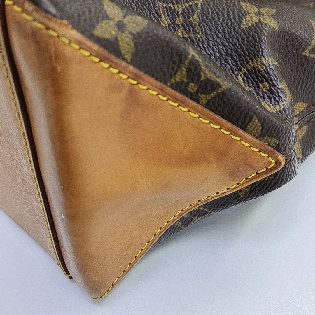 PIANO Monogram Coated Canvas Brown