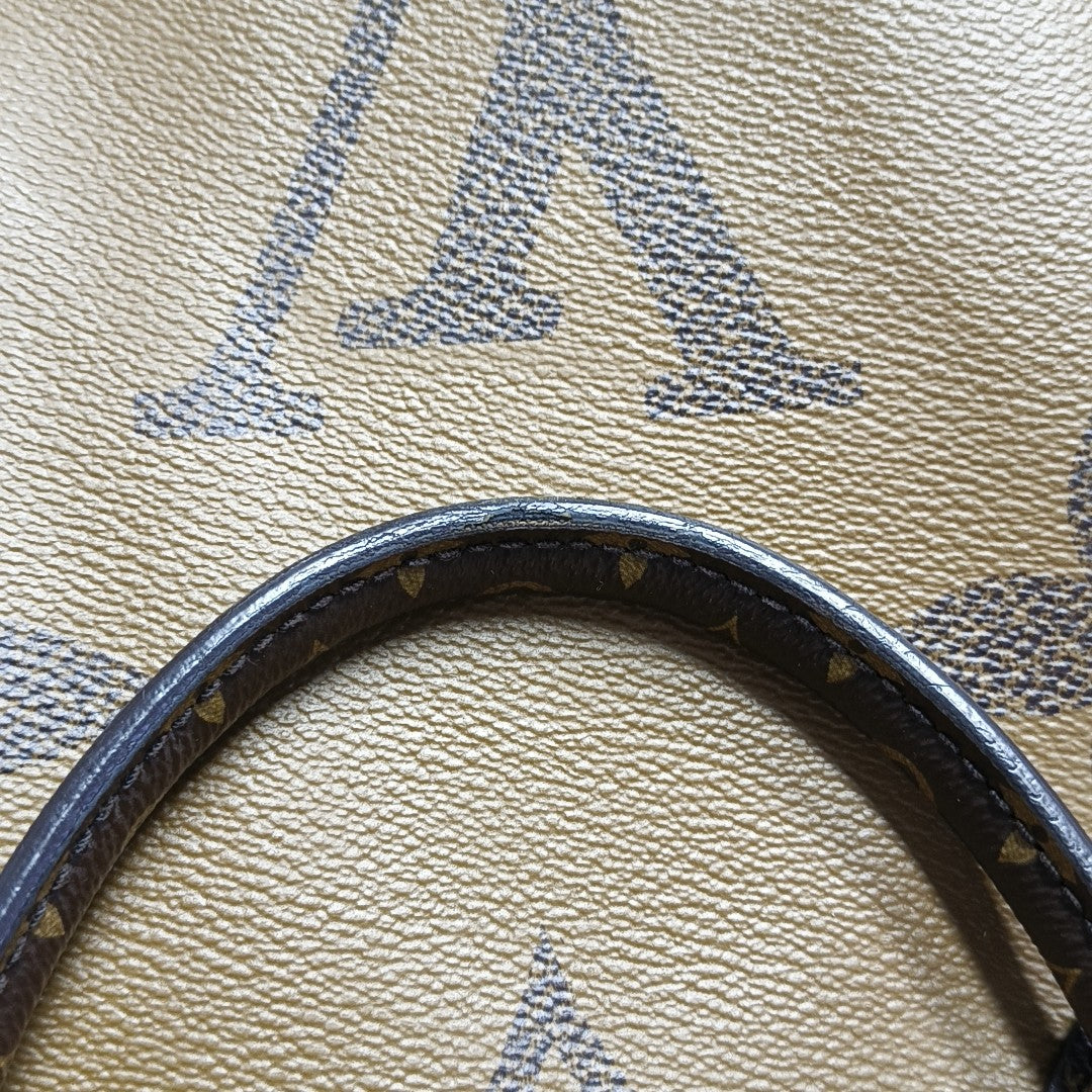 ONTHEGO GM Monogram Coated Canvas Brown