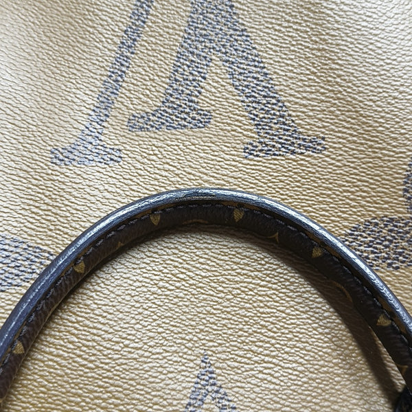 ONTHEGO GM Monogram Coated Canvas Brown