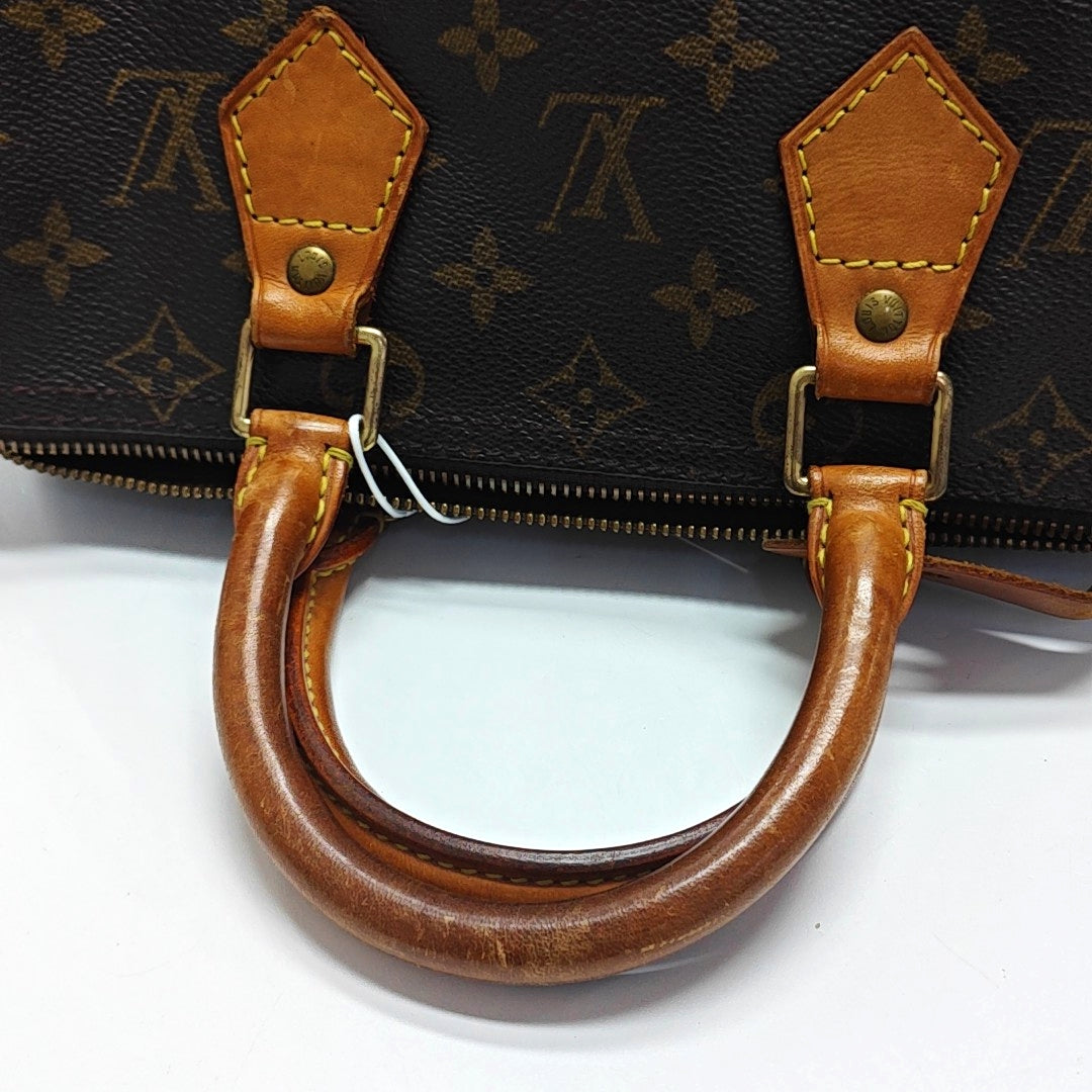 SPEEDY 25 Monogram Coated Canvas Brown