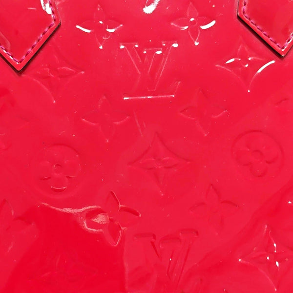 Authenticated pre-owned  ALMA PM Monogram Patent Leather Red - Top Handle Bag at Looply