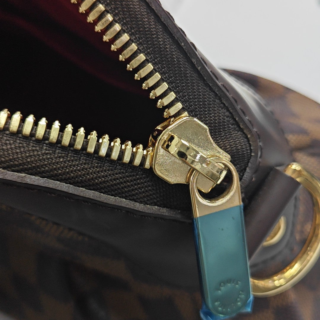 TREVI PM Damier Ebene Coated Canvas Brown
