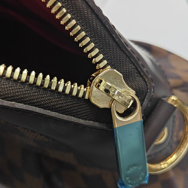 TREVI PM Damier Ebene Coated Canvas Brown