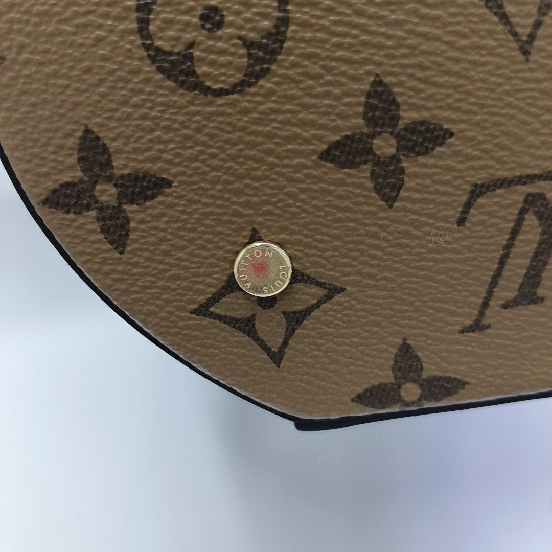 CANNES PM Monogram Coated Canvas Brown