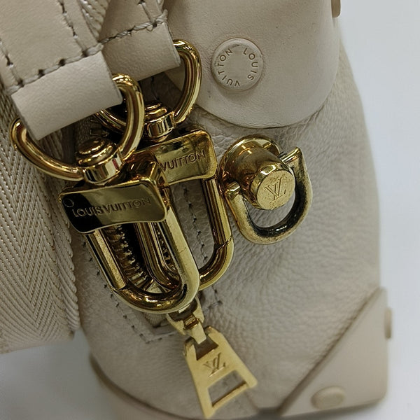 PETITE MALLE Monogram Calfskin Beige