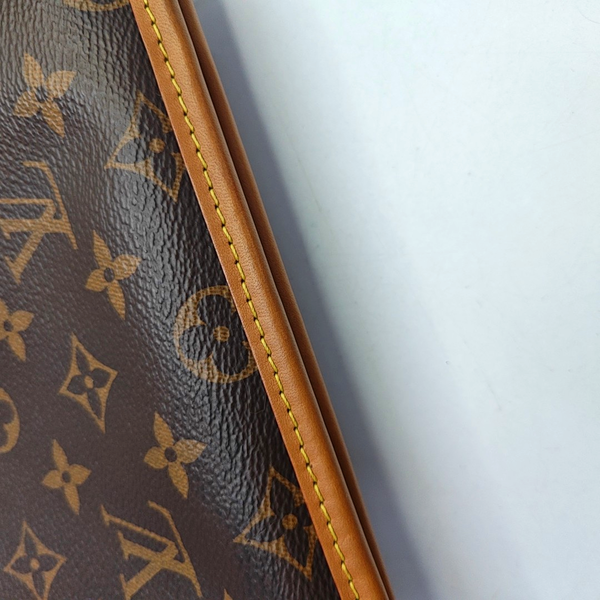 SAUMUR PM Monogram Coated Canvas Brown