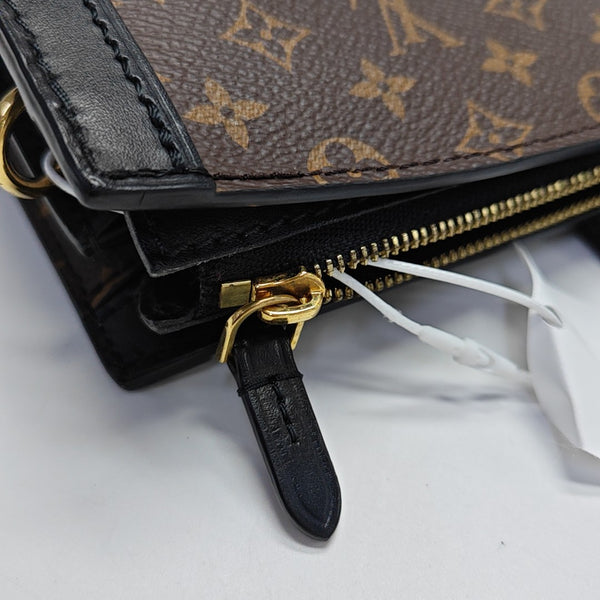 TRUNK Monogram Coated Canvas Brown