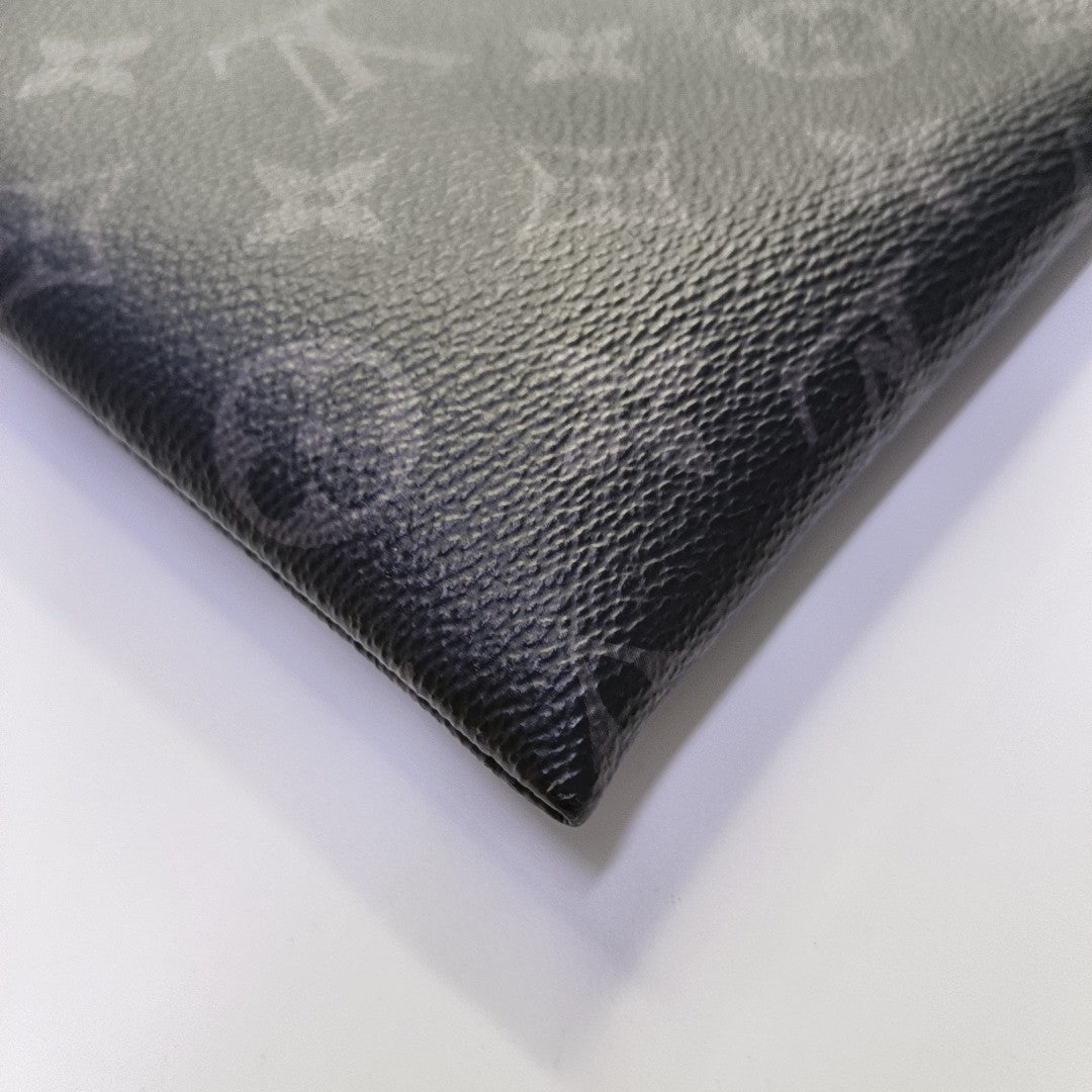 DISCOVERY Monogram Coated Canvas Gray
