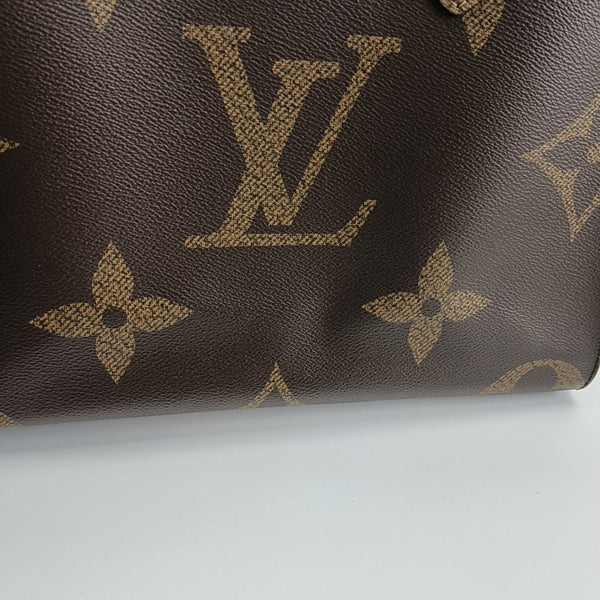 ONTHEGO MM Monogram Coated Canvas Brown