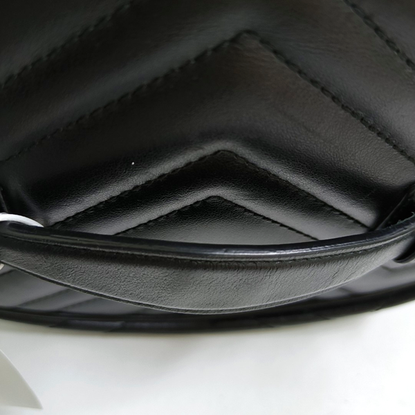 Authenticated pre-owned  GG Marmont Small Quilted Calfskin Black - Top Handle Bag at Looply