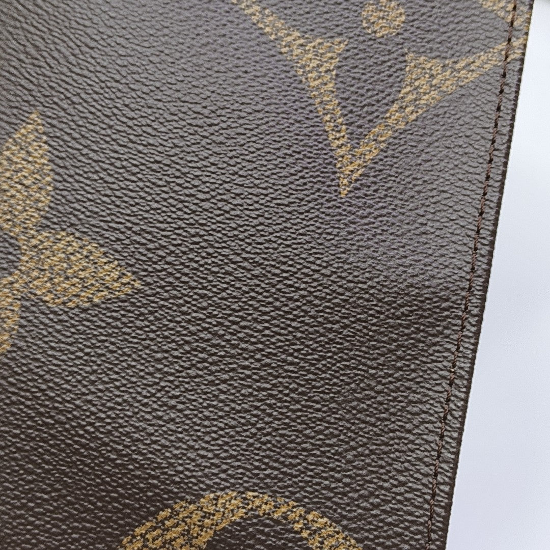 ONTHEGO MM Monogram Coated Canvas Brown