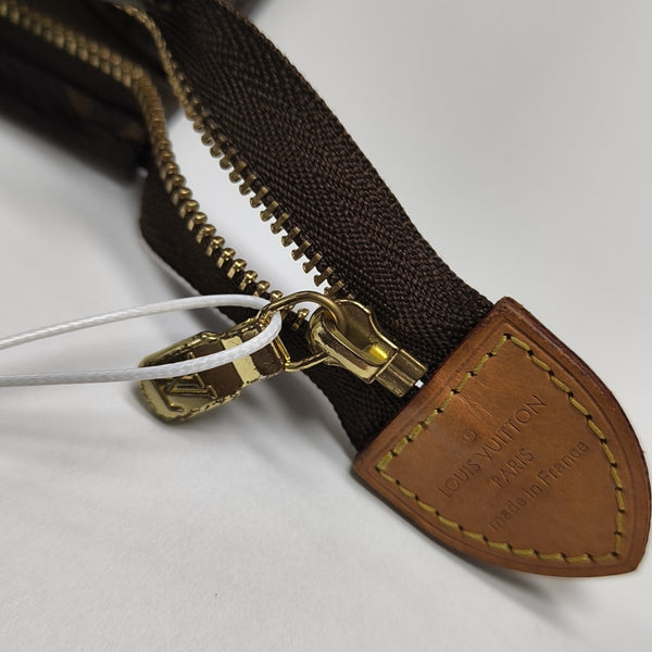 TOILET POCKET 26 Monogram Coated Canvas Brown