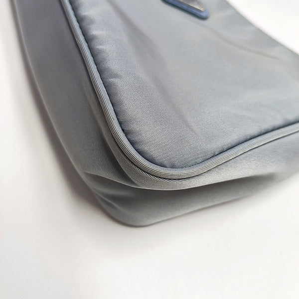 Authenticated pre-owned  Re-Edition2000 Nylon Blue - Top Handle Bag at Looply