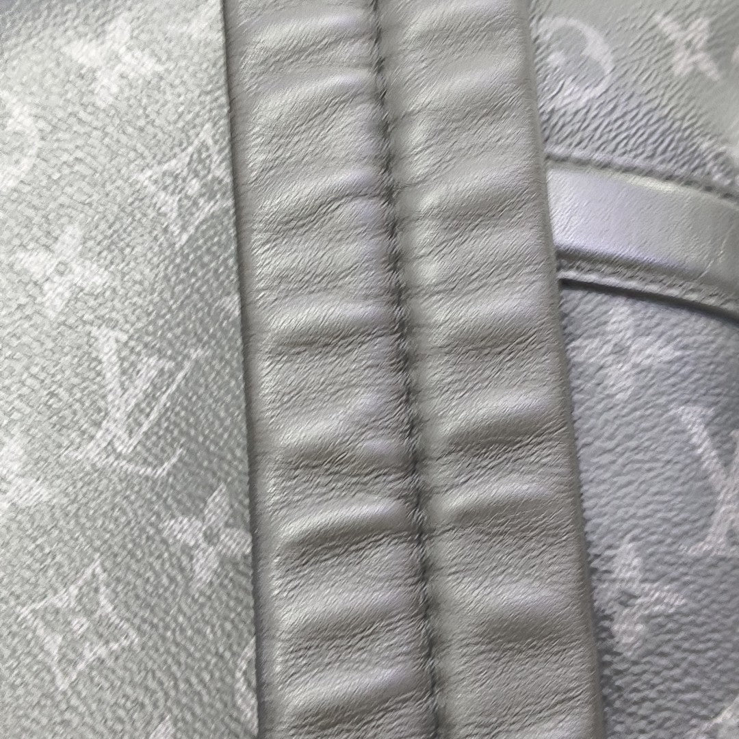 DISCOVERY Monogram Coated Canvas Gray