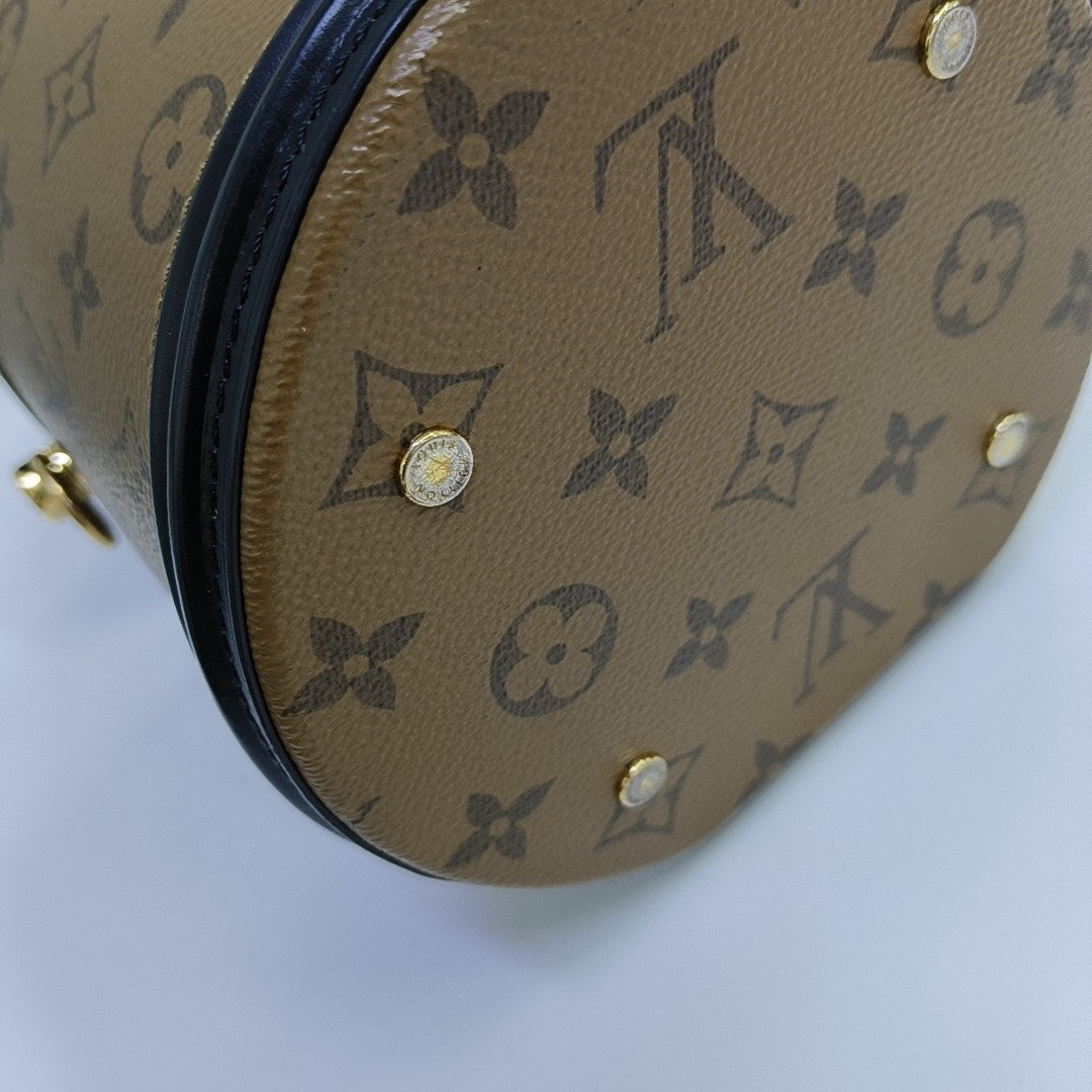 CANNES PM Monogram Coated Canvas Brown