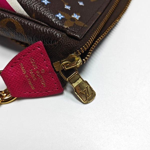 Authenticated pre-owned  ACCESSOIRES Mini Monogram Coated Canvas Brown - Top Handle Bag at Looply