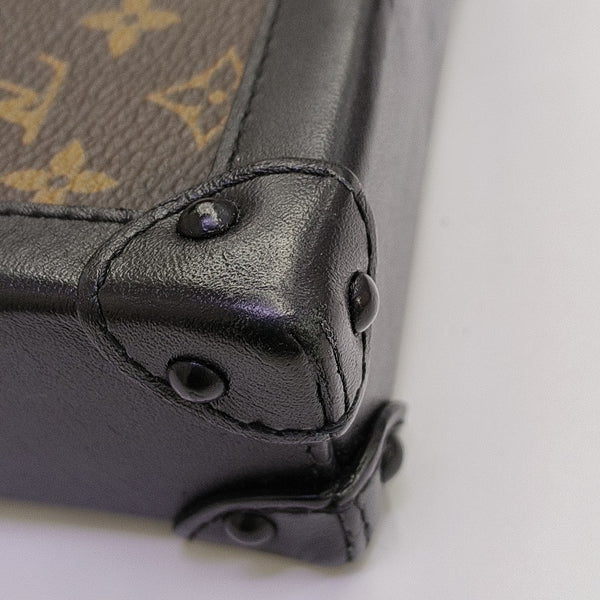 TRUNK Monogram Coated Canvas Brown