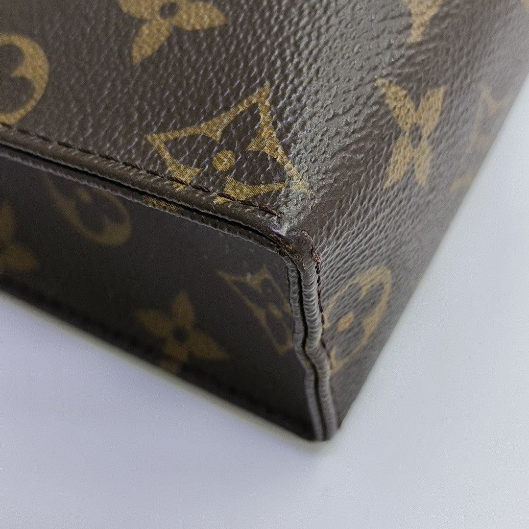 TOILET POCKET 26 Monogram Coated Canvas Brown