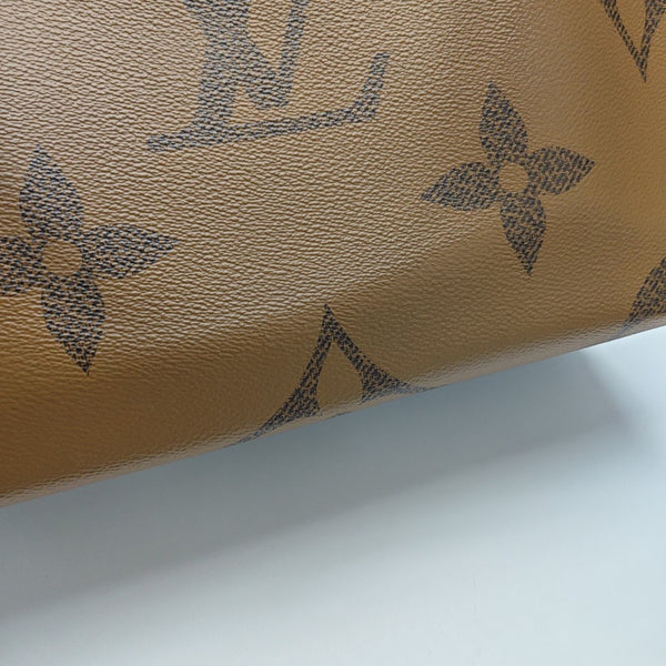 ONTHEGO MM Monogram Coated Canvas Brown