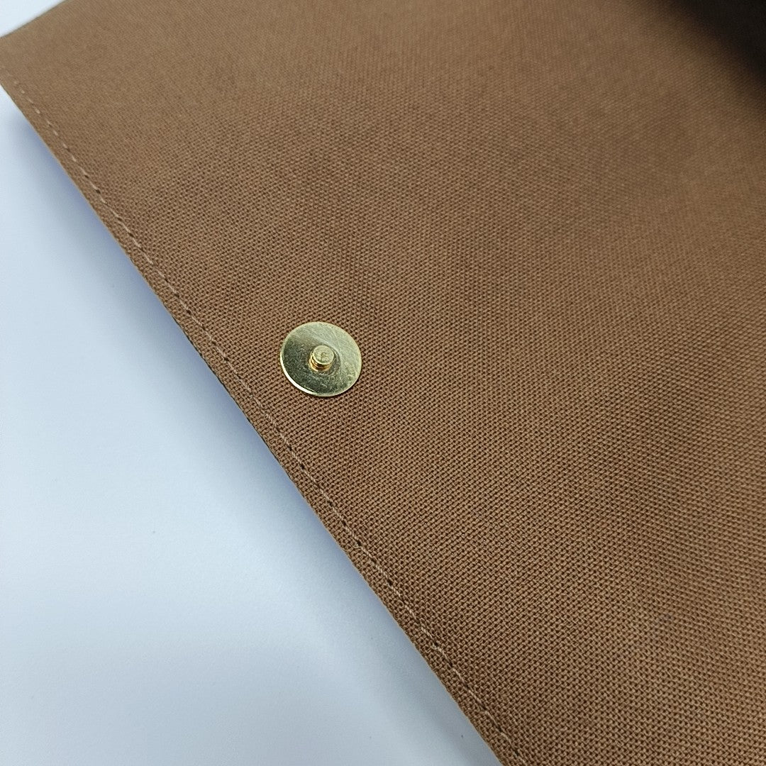 LOOPING PM Monogram Coated Canvas Brown