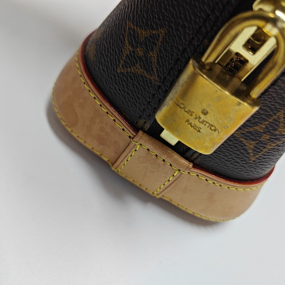 ALMA BB Monogram Coated Canvas Brown