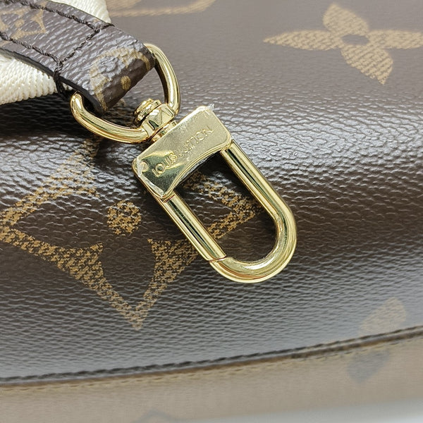 ONTHEGO PM Monogram Coated Canvas Brown