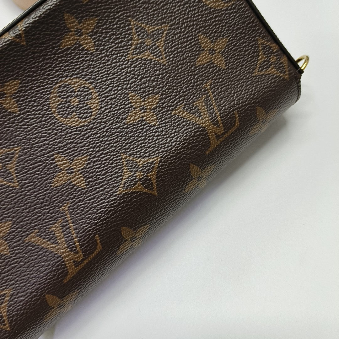 FÉLICIE Monogram Coated Canvas Brown