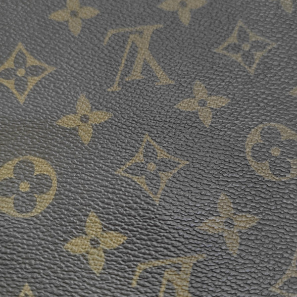 KITAN Monogram Coated Canvas Brown