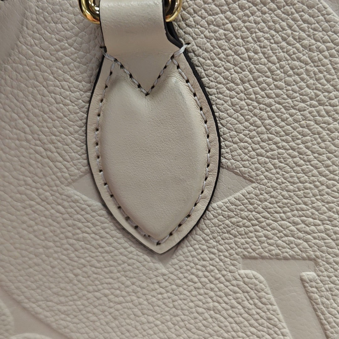 ONTHEGO PM Monogram Calfskin Beige