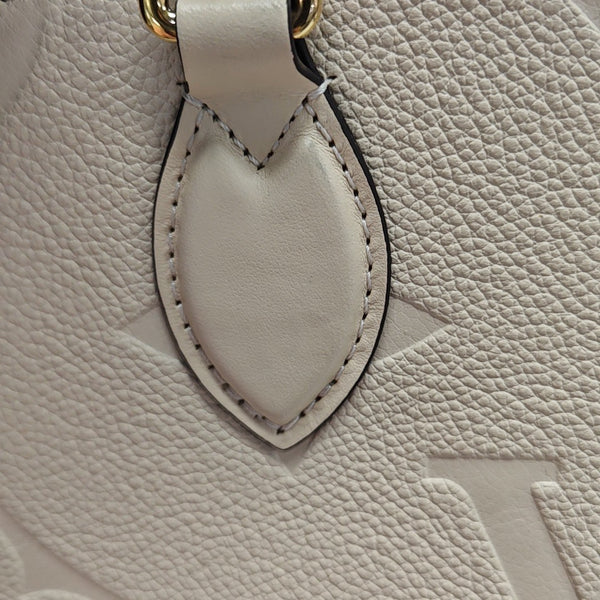 ONTHEGO PM Monogram Calfskin Beige
