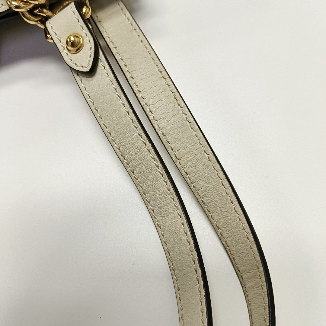 Padlock Small Monogram Coated Canvas Beige