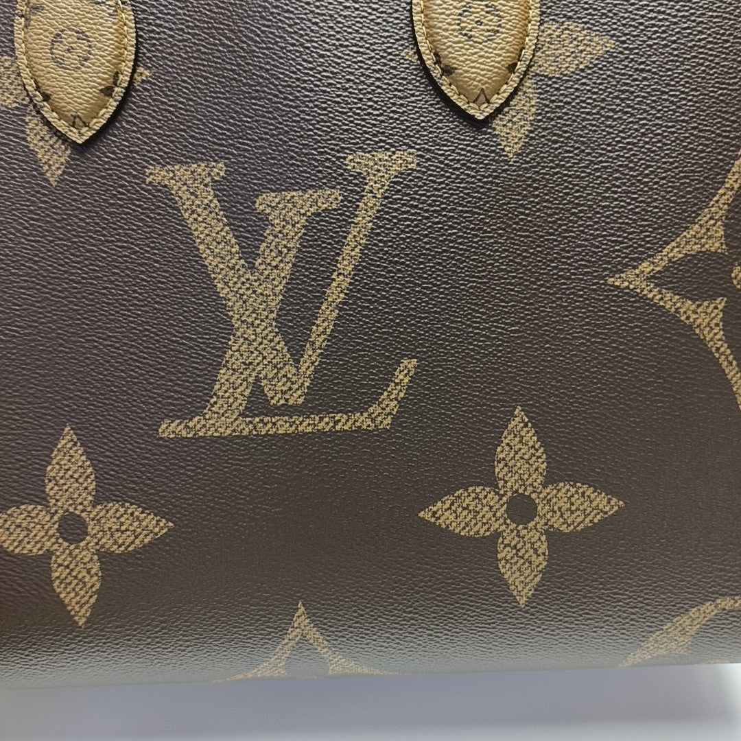 ONTHEGO MM Monogram Coated Canvas Brown