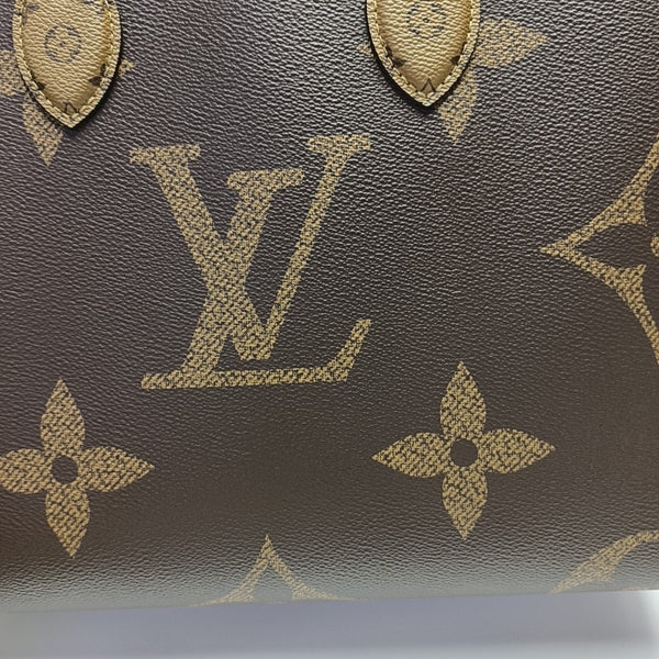 ONTHEGO MM Monogram Coated Canvas Brown