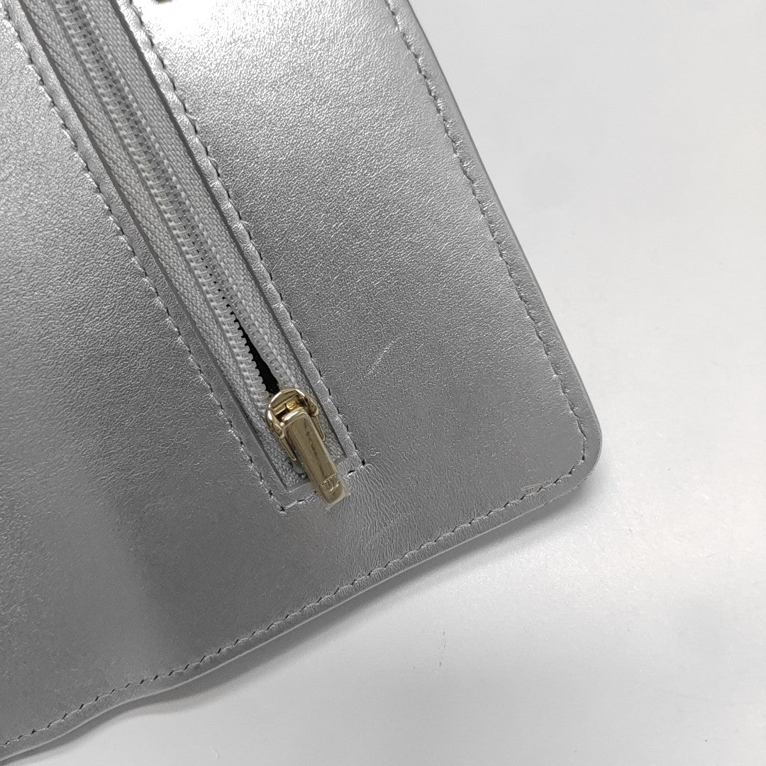 WOC Quilted Lambskin Silver