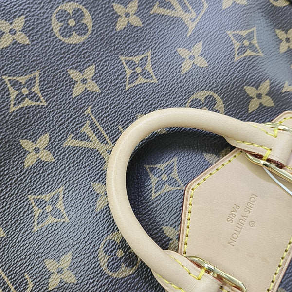 EXCURSION PM Monogram Coated Canvas Brown