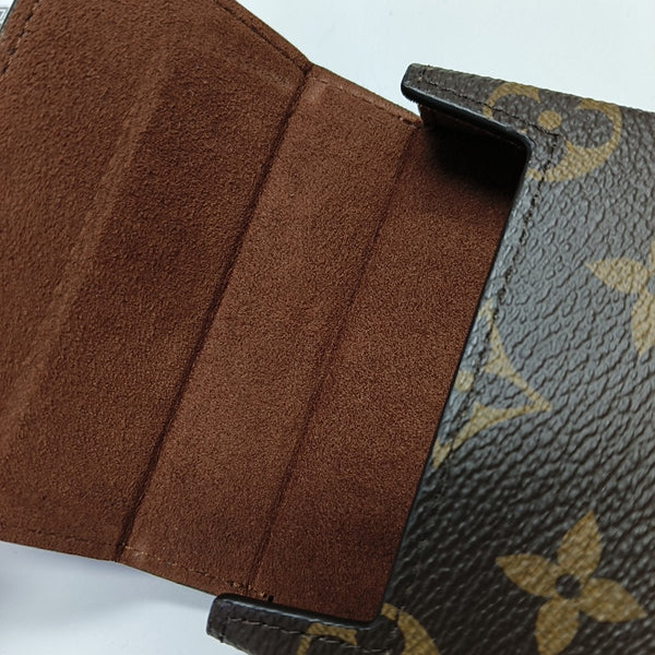 Monogram Coated Canvas Clutch Brown