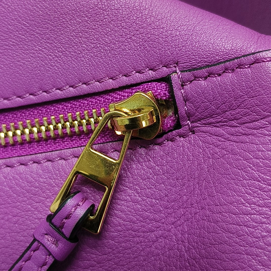 Authenticated pre-owned  Puzzle Hobo Calfskin Purple - Top Handle Bag at Looply