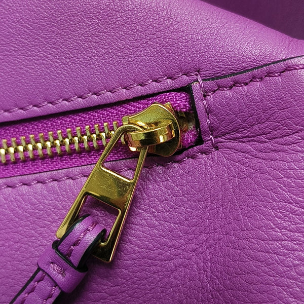 Authenticated pre-owned  Puzzle Hobo Calfskin Purple - Top Handle Bag at Looply
