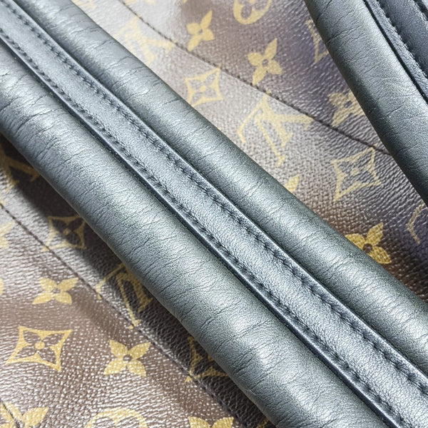 Monogram Coated Canvas Backpack Brown