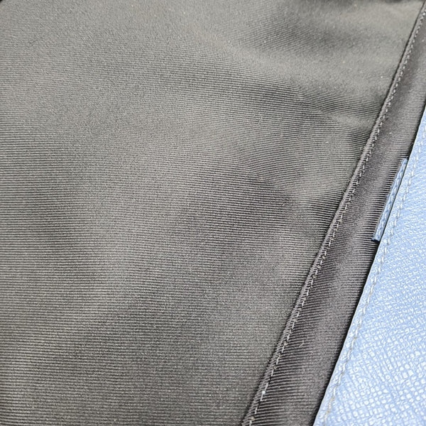 TAIGARAMA Monogram Coated Canvas Blue