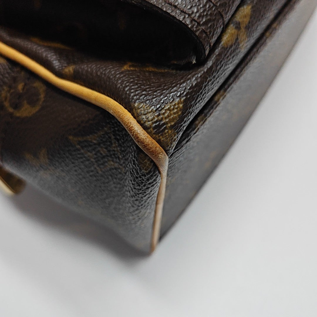 MANHATTAN PM Monogram Coated Canvas Brown
