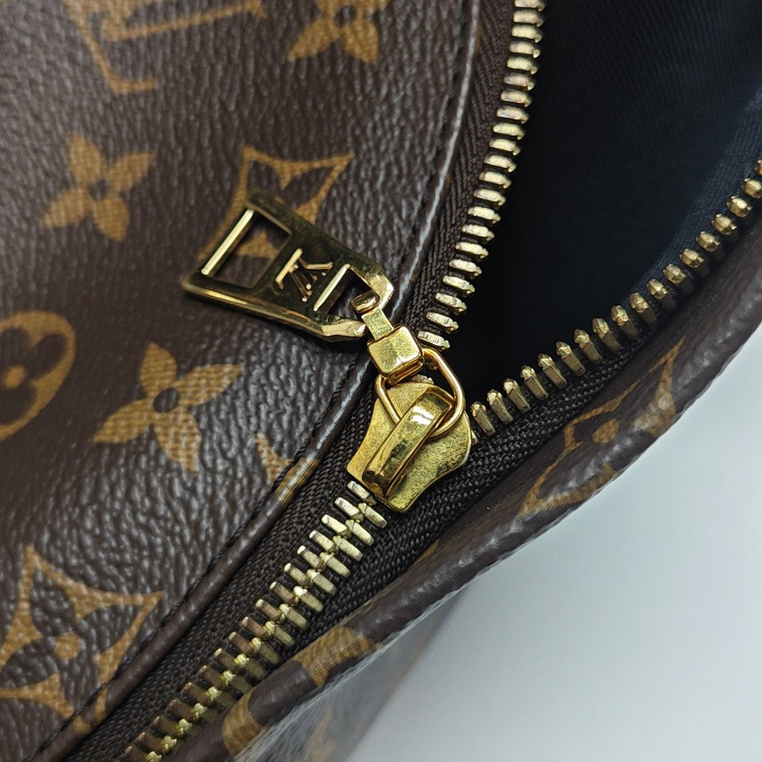 Monogram Coated Canvas Backpack Brown