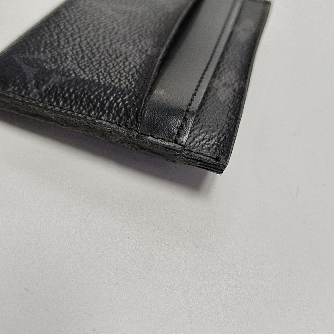 Monogram Coated Canvas Clutch Black